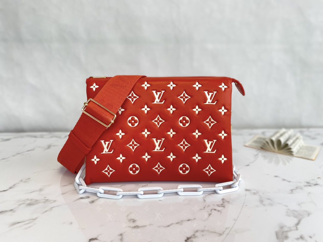 Louis Vuitton COUSSIN PM Handbag Monogram-embossed puffy lambskin Terracotta Brown M20761