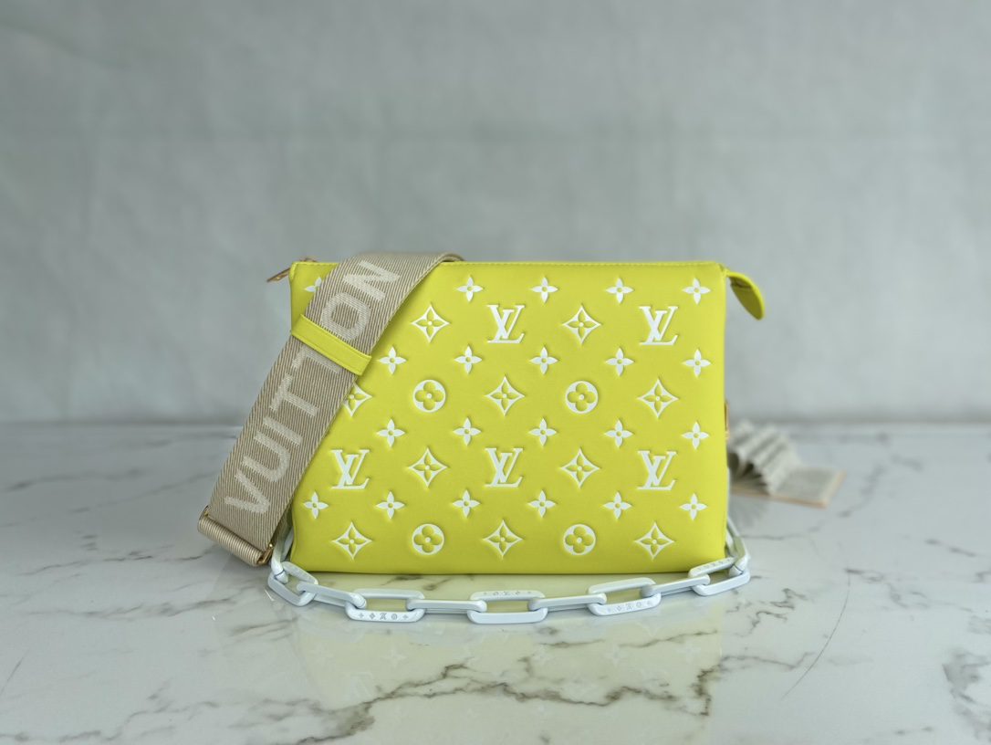 Louis Vuitton COUSSIN PM Handbag Monogram-embossed puffy lambskin Yellow M20843