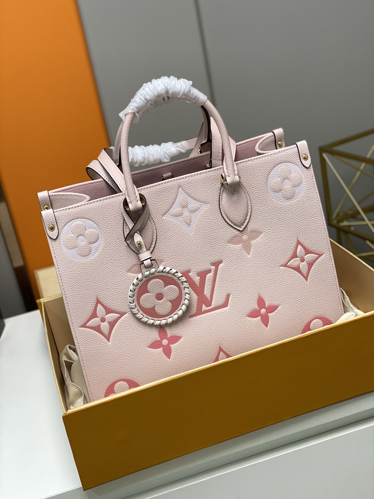 Replica Louis Vuitton M45595 Onthego PM Embossed Grained Cowhide Leather Pink